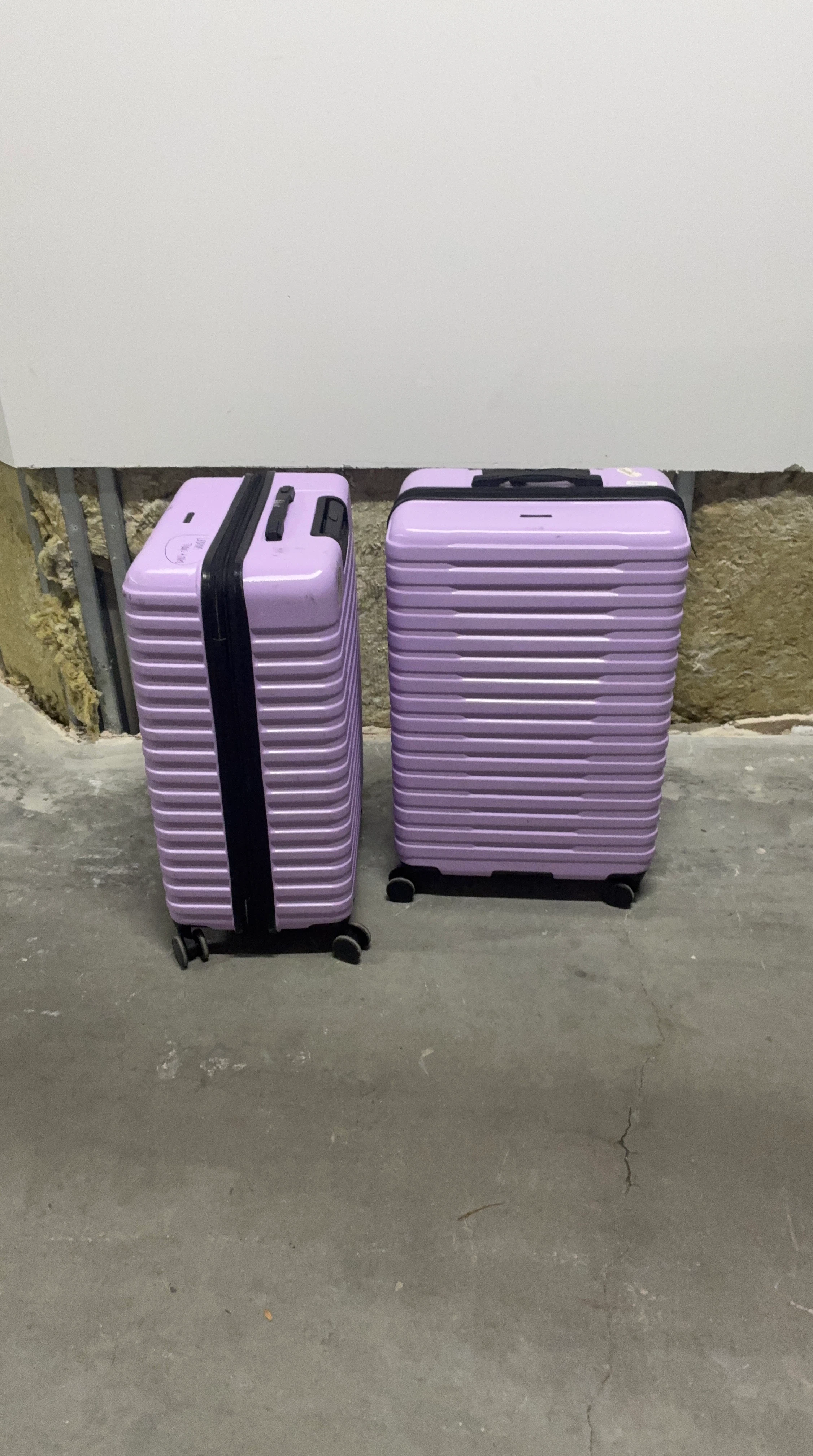 Two Lavender Hardshell Suitcases