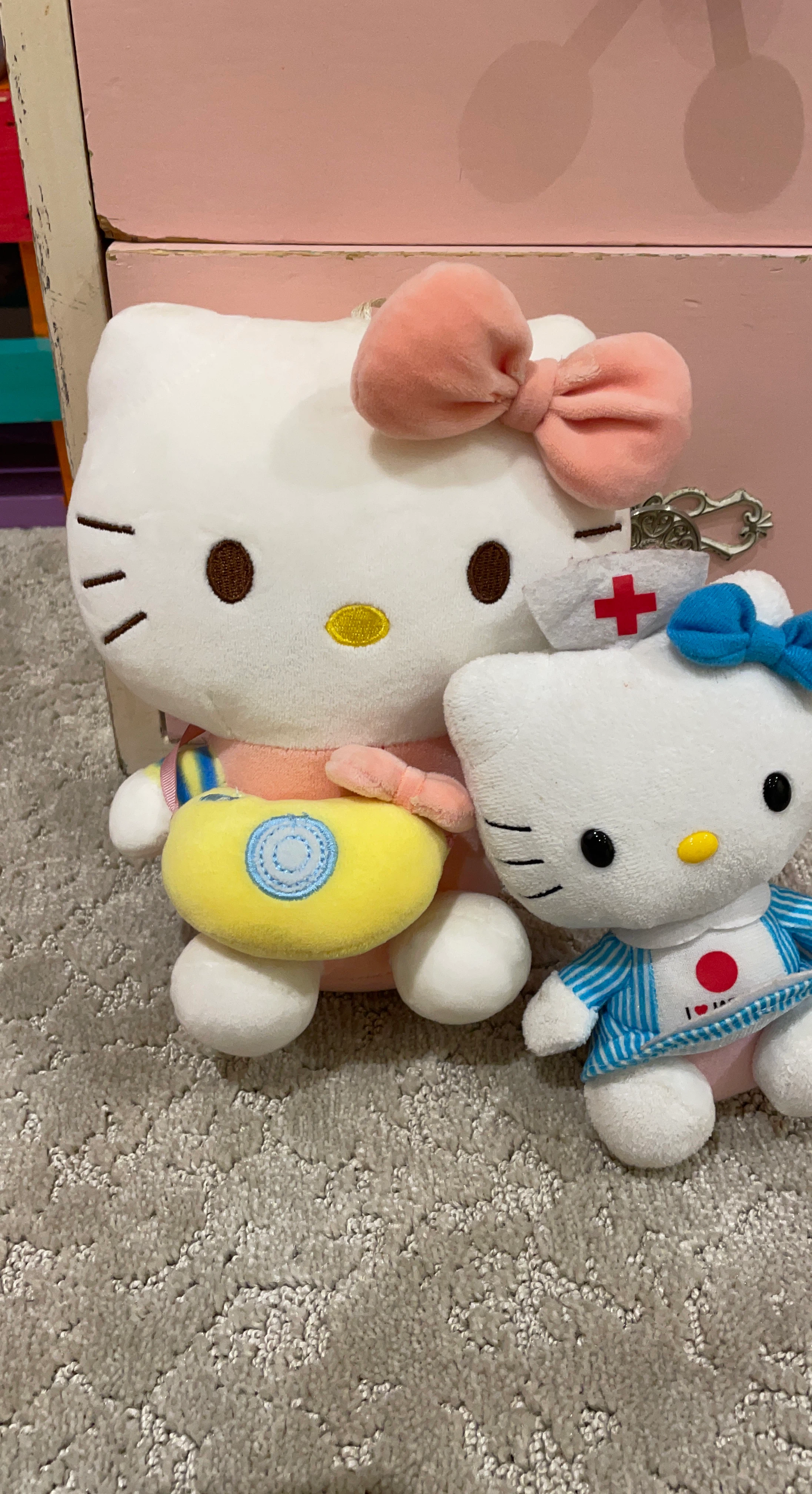 Two Hello Kitty Plush Toys