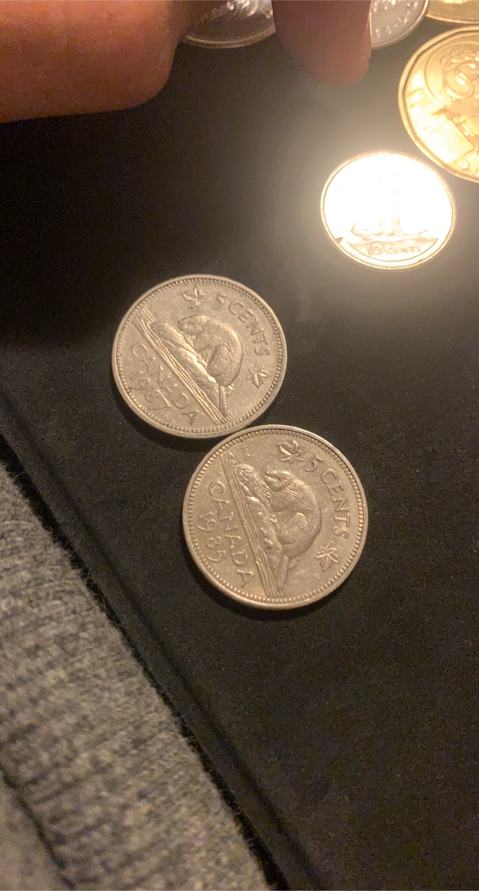 Two Canadian 5 Cent Coins
