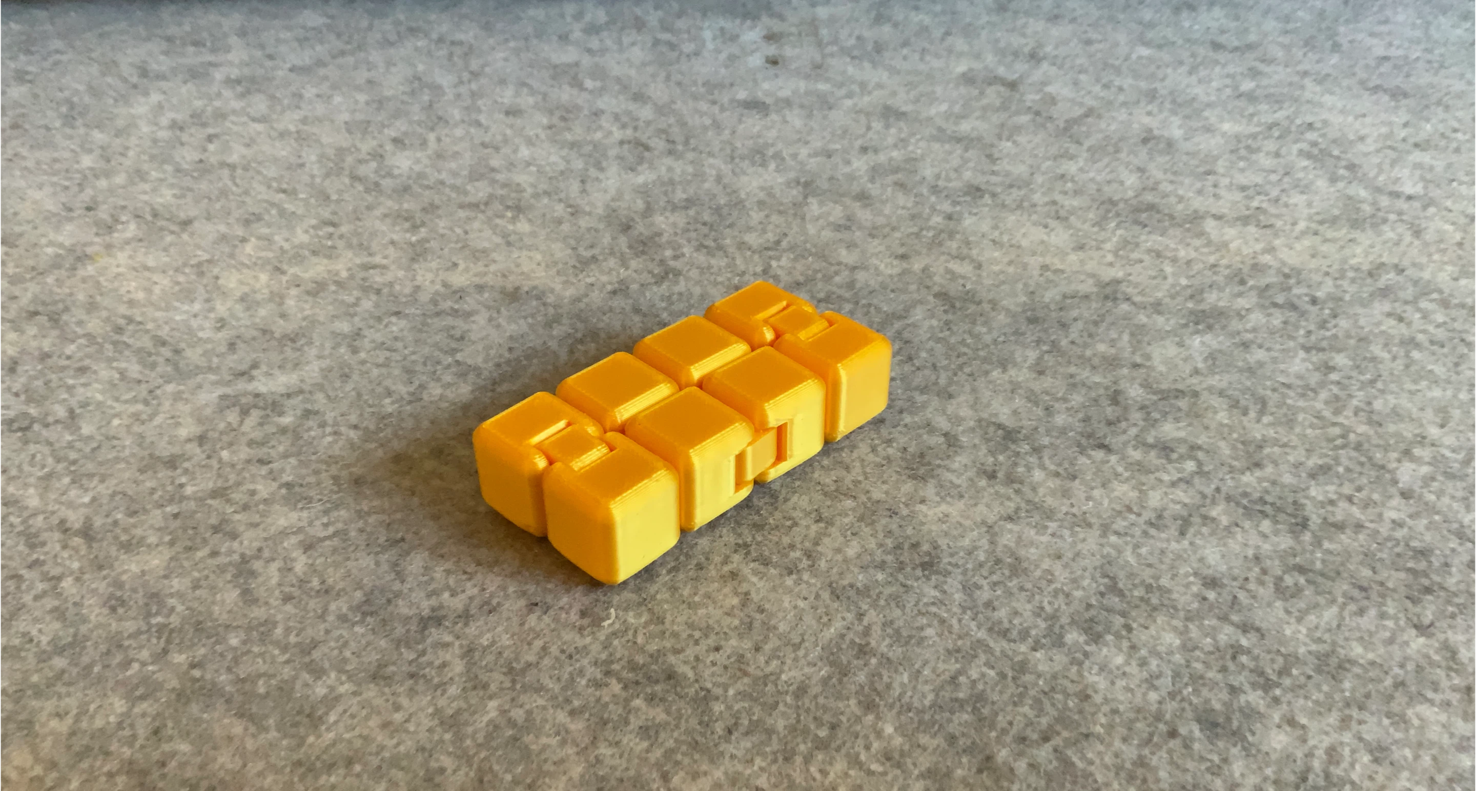 Yellow Infinity Cube Fidget Toy