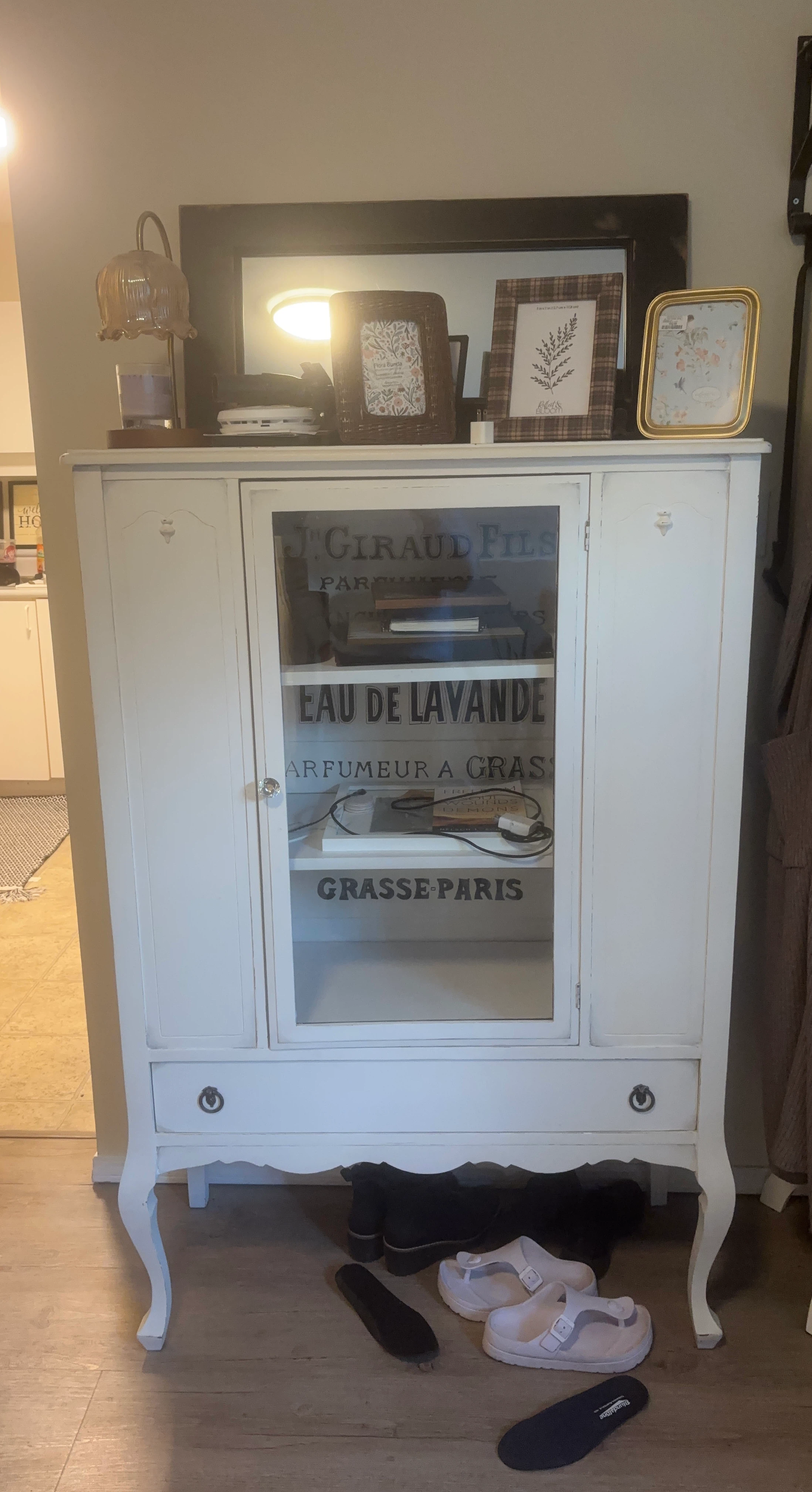 White painted curio cabinet with glass door
