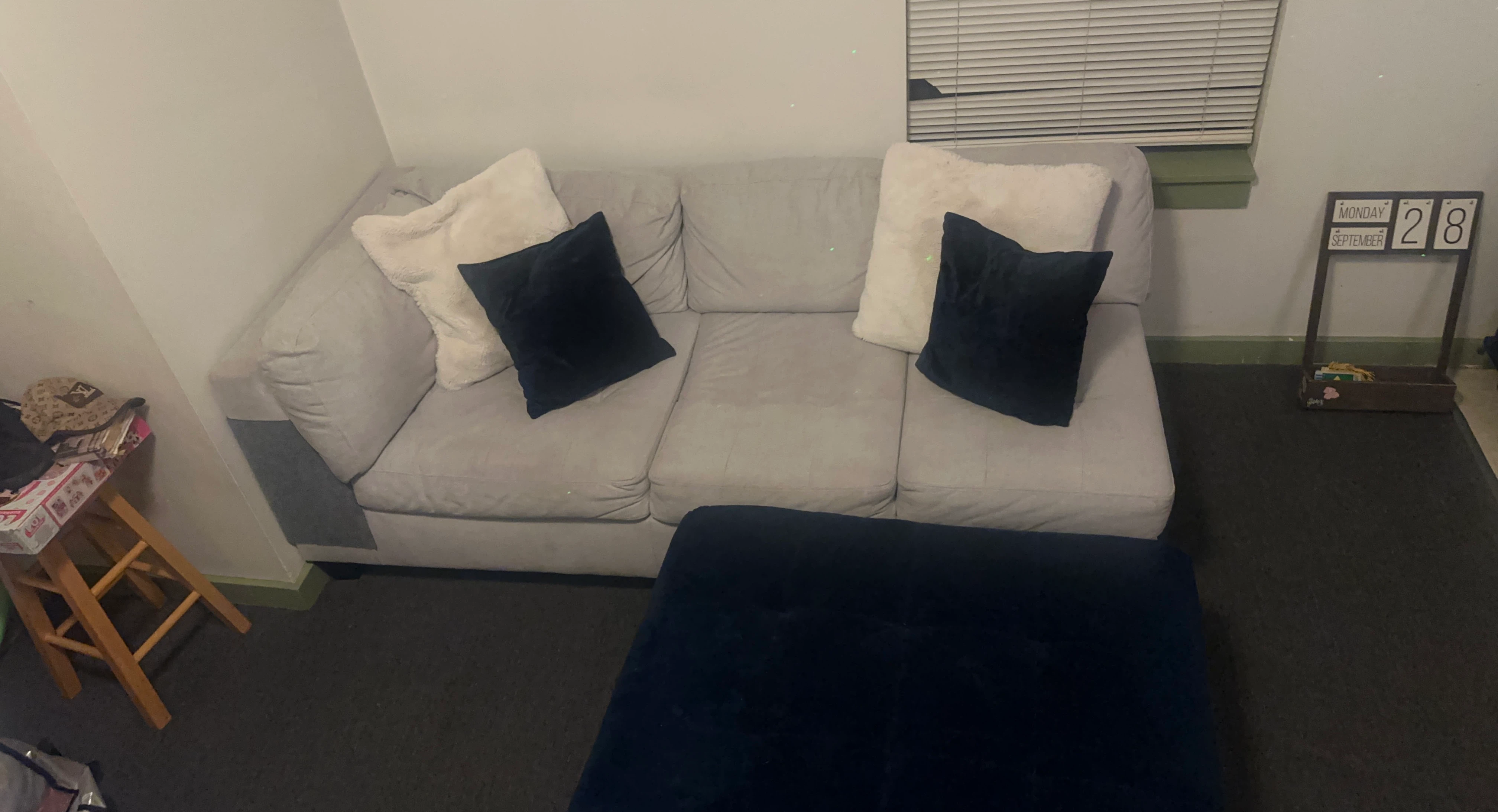 Gray Three-Seat Sofa with Ottoman
