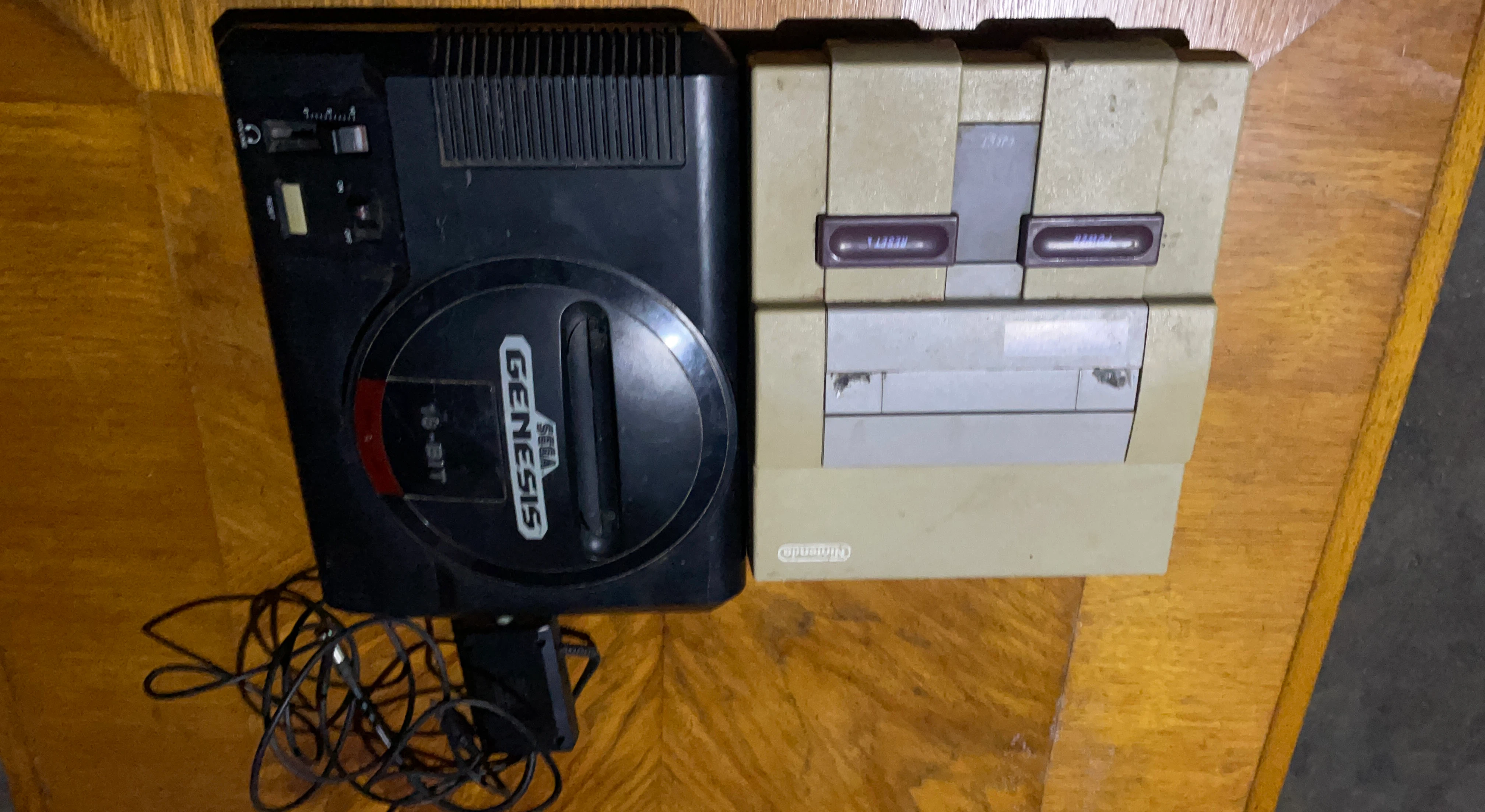 Sega Genesis and Nintendo Super NES Game Consoles