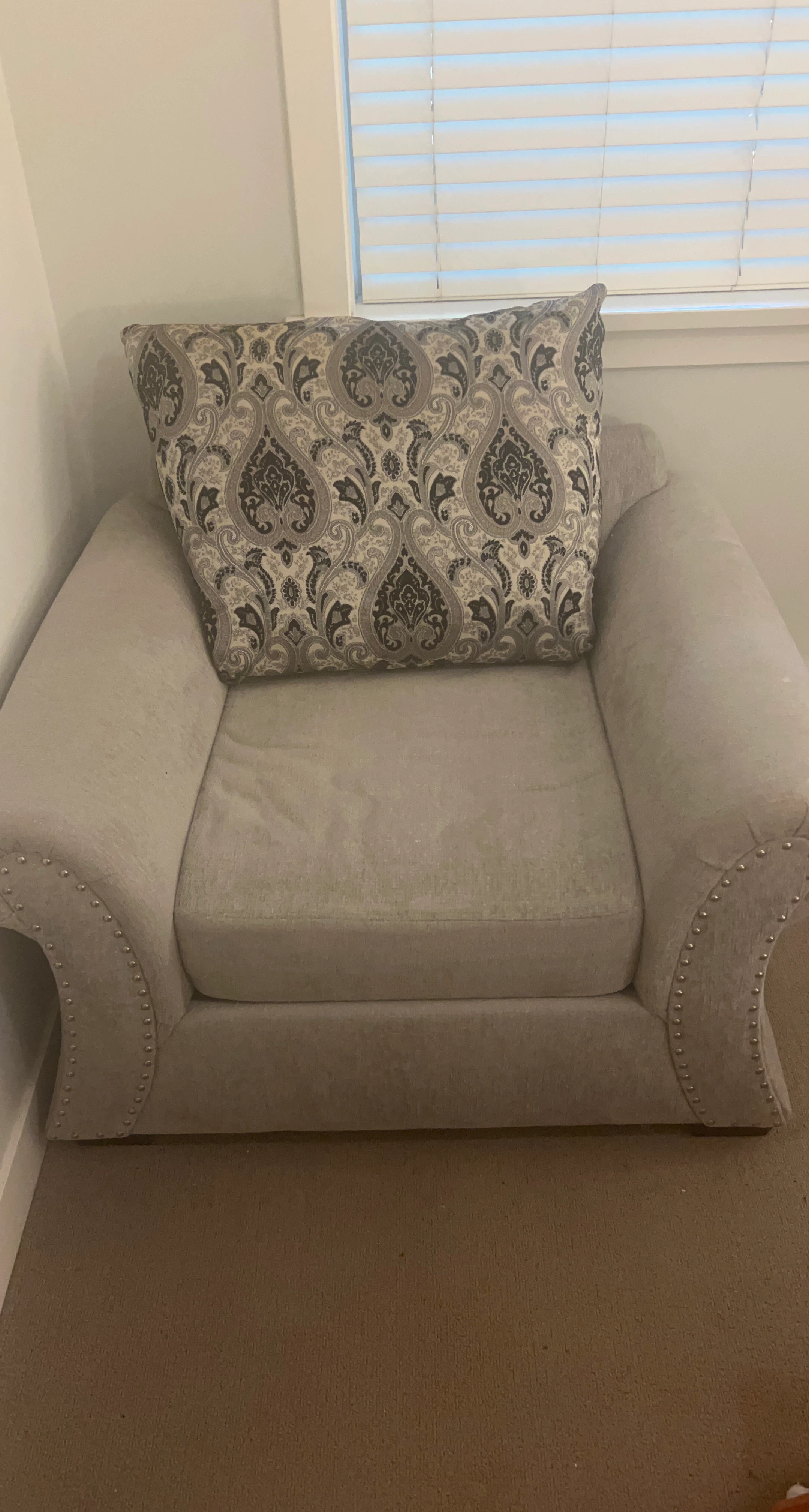 Armchair with Paisley Accent Pillow
