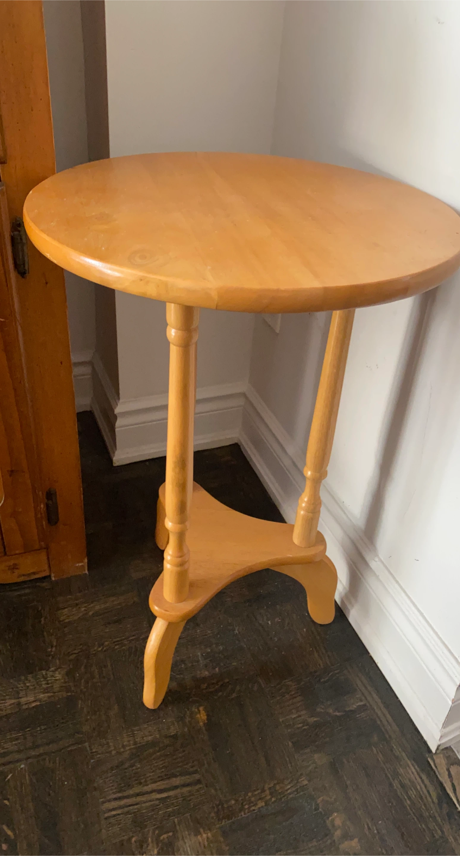 Round wooden side table
