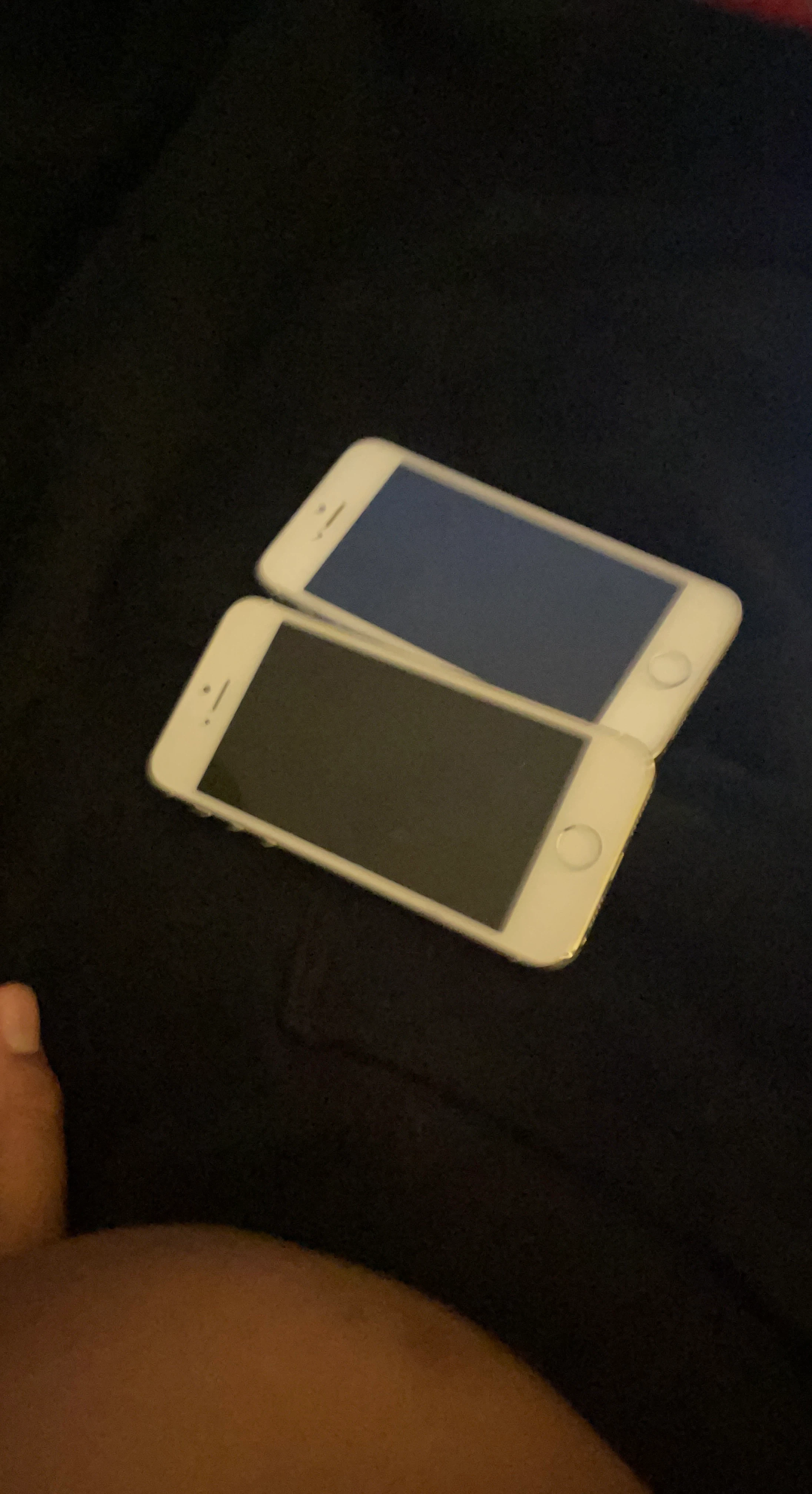 Two Apple iPhone 5/5s units