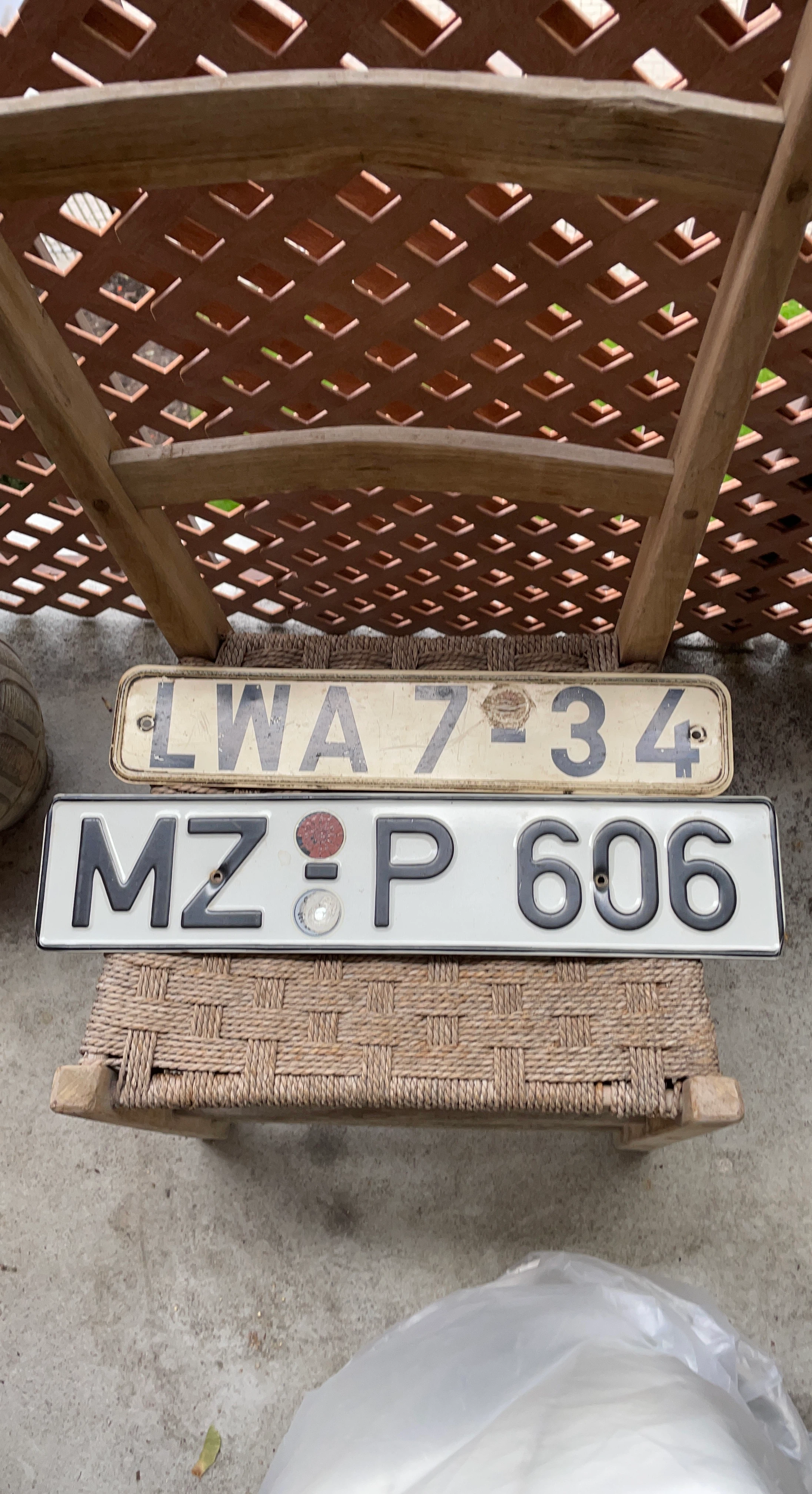 Two Vintage License Plates
