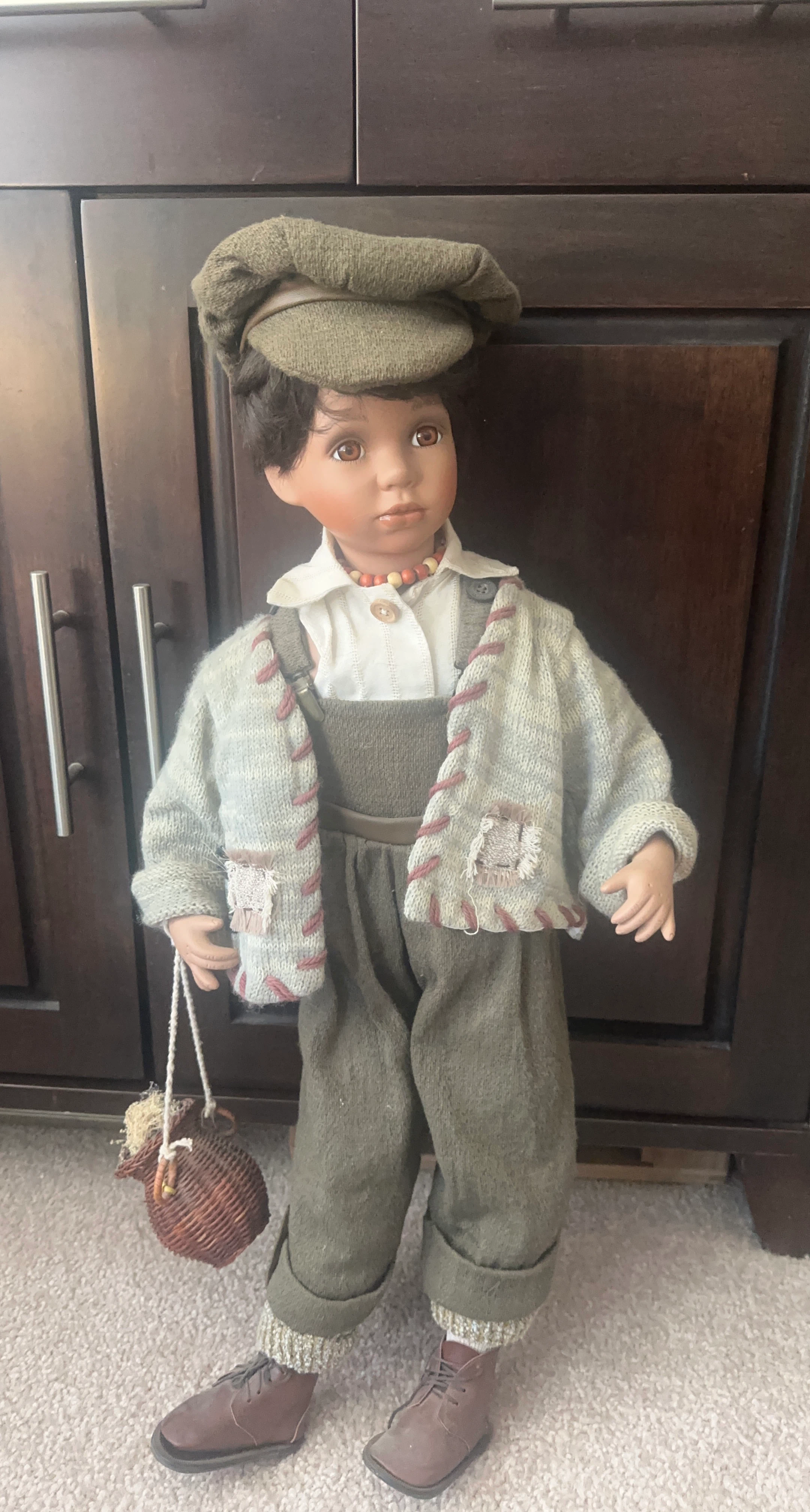 Porcelain Boy Doll with Hat and Basket