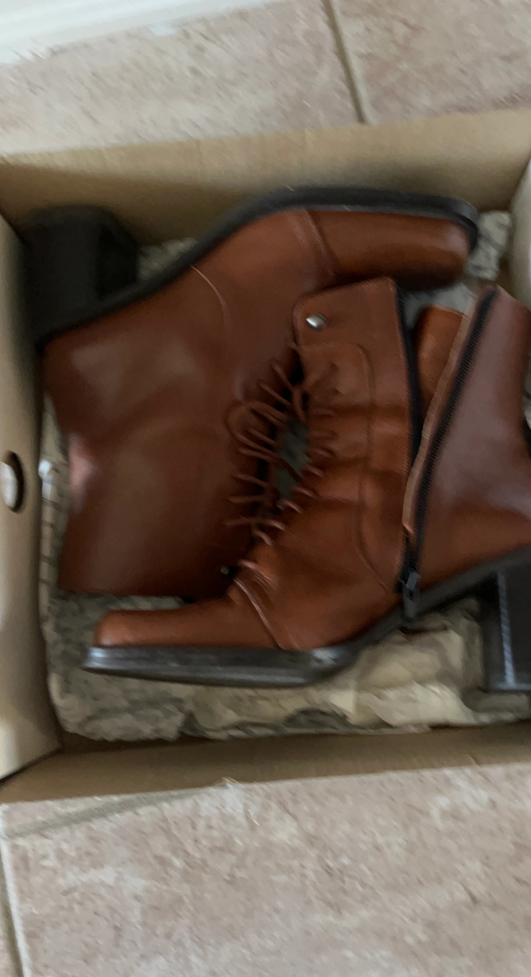 Brown lace-up heeled boots