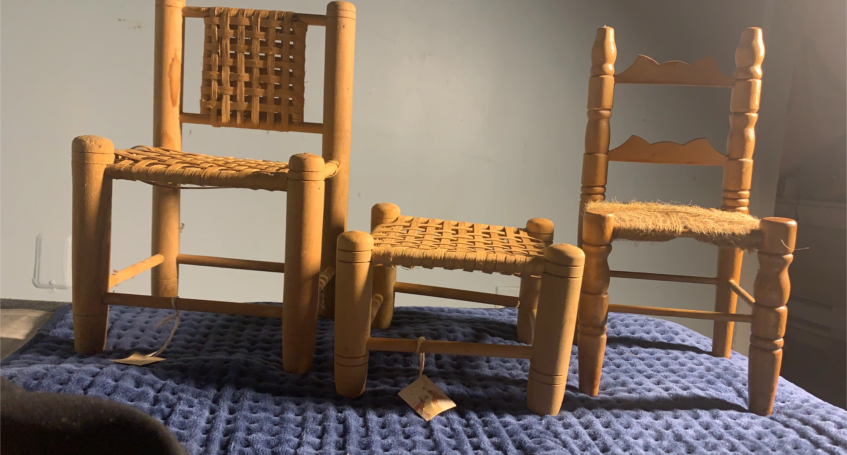 Set of three wooden doll chairs made  in Haiti