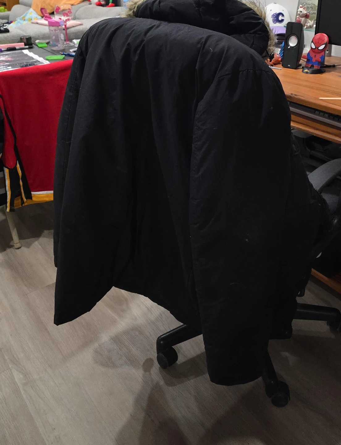Black winter parka with faux fur trim