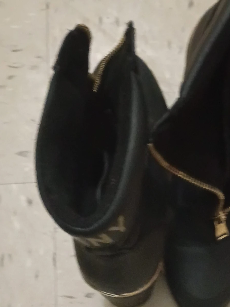 DKNY black boots with gold zipper