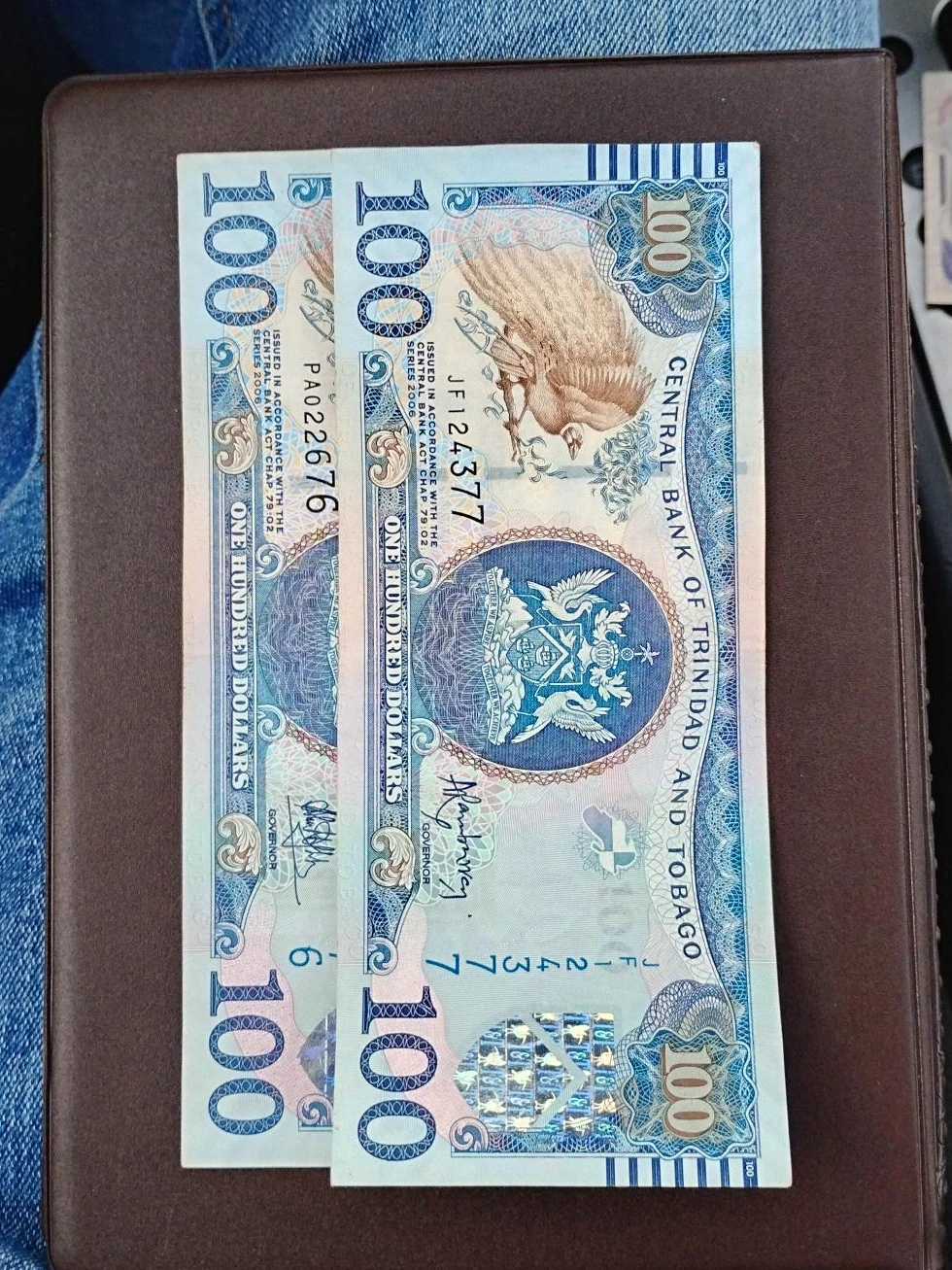 Two Trinidad and Tobago 100 Dollar Banknotes