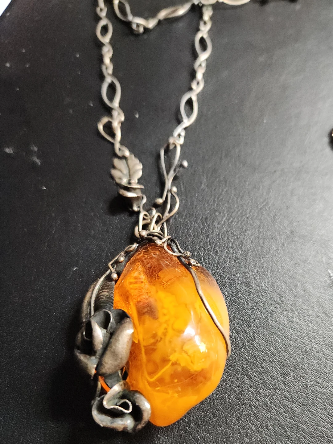 Amber Pendant Necklace with Silver Floral Detail