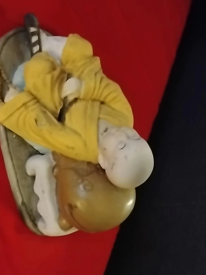 Decorative monk figurine on base