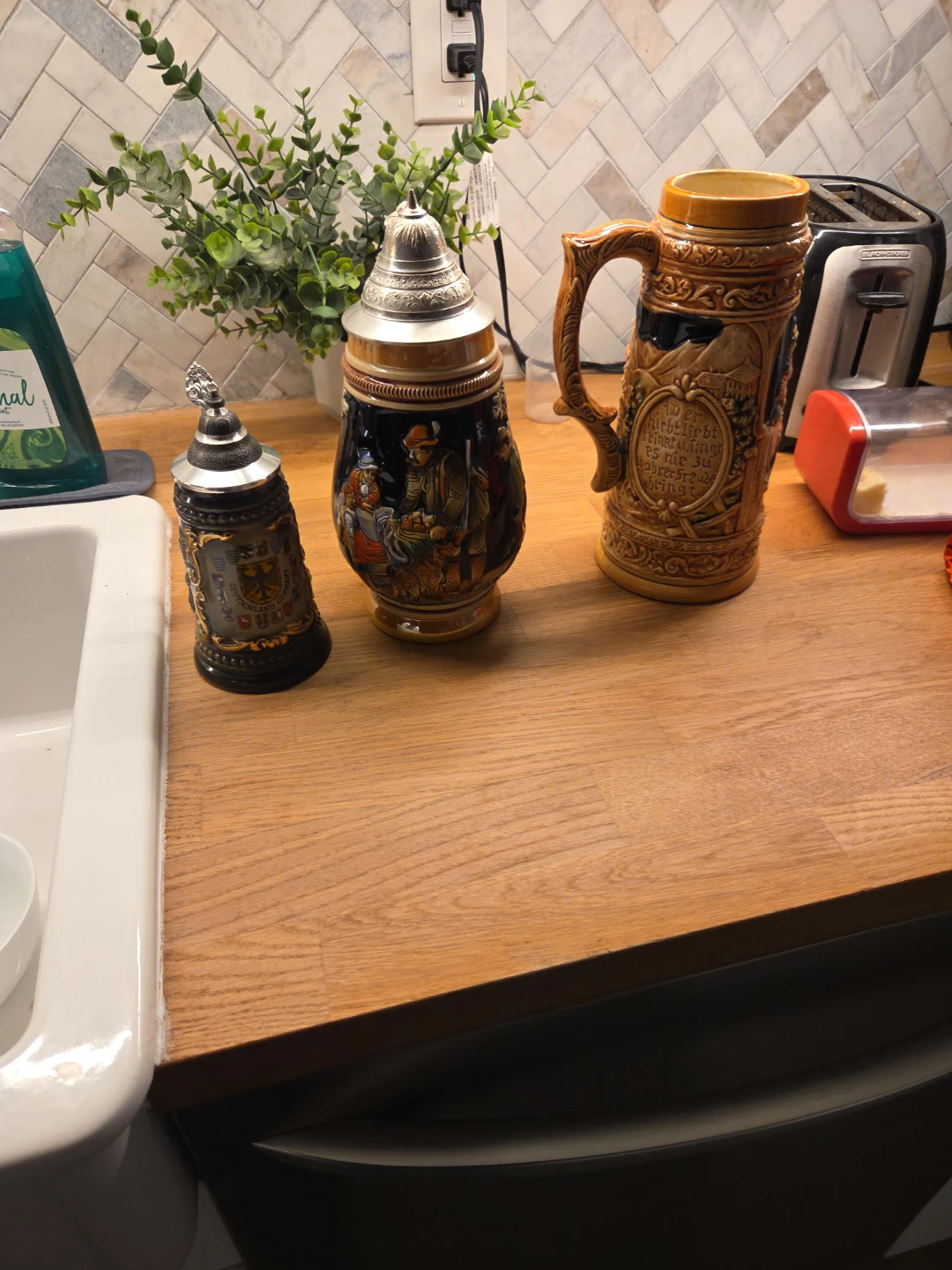 Set of three vintage German beer steins