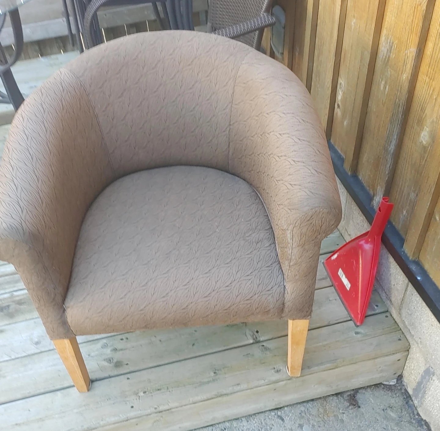 Brown fabric tub chair