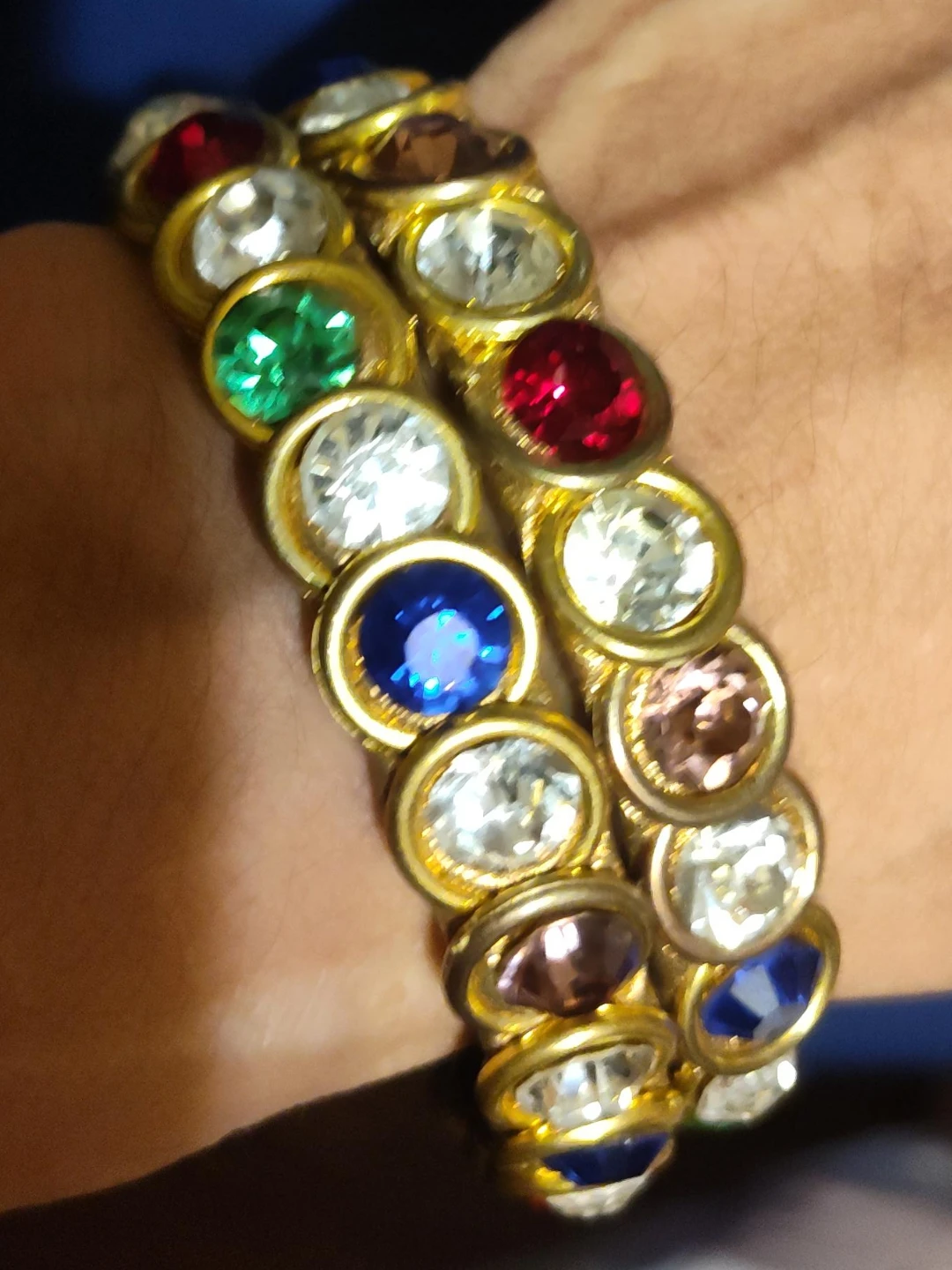 Two multi-coloured stone bangles