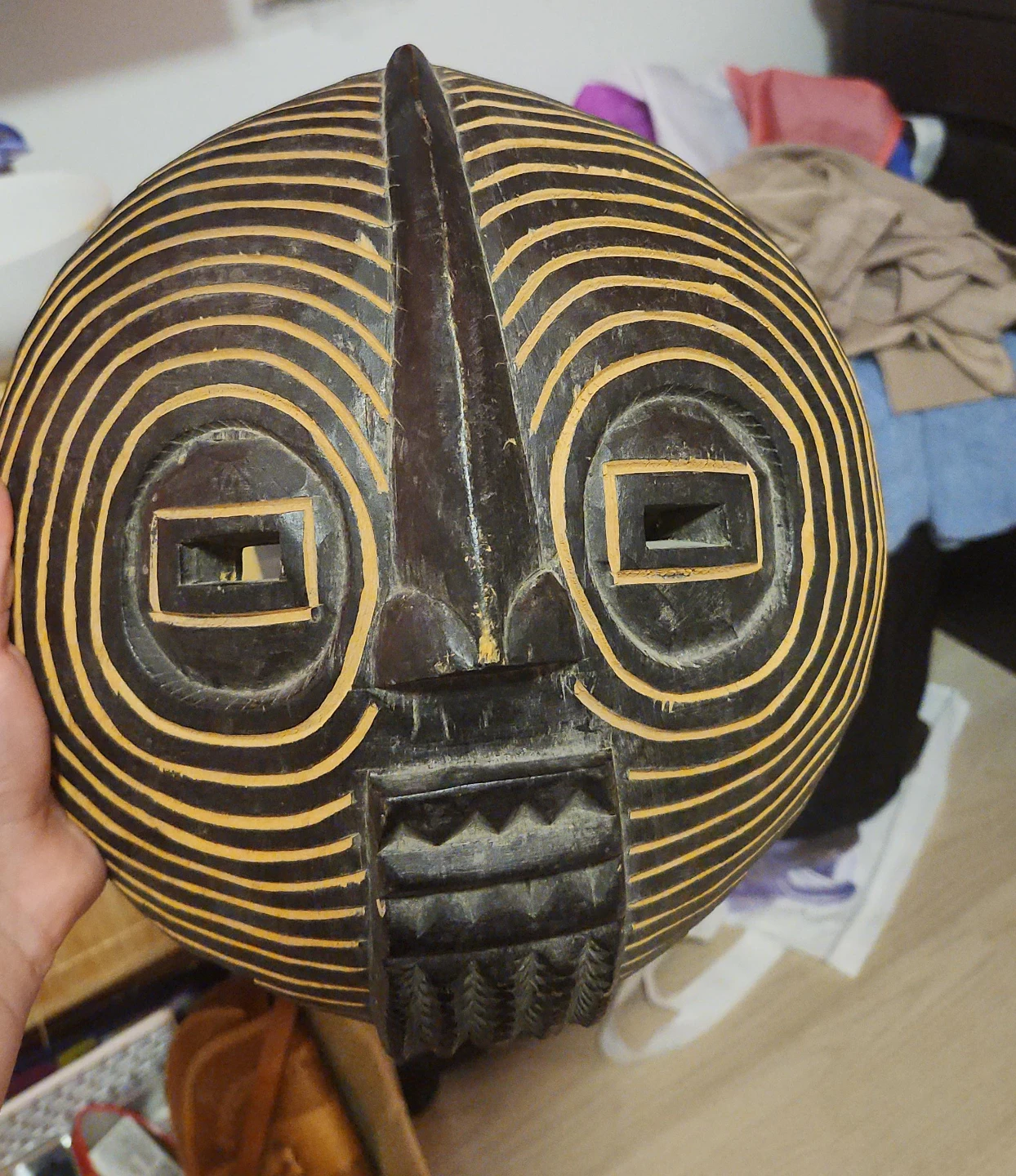 Hand-carved wooden decorative mask