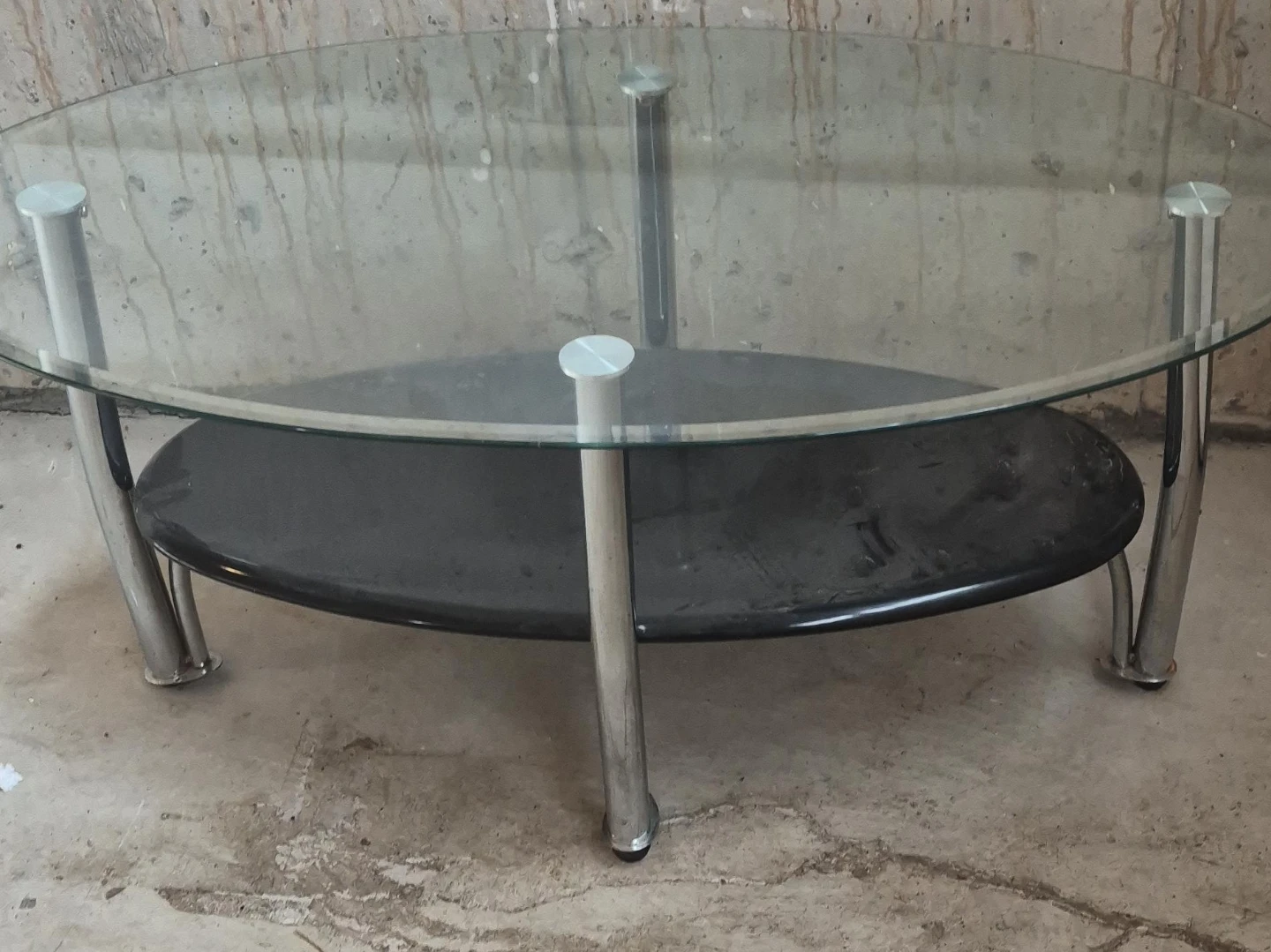 Oval Glass and Black Coffee Table