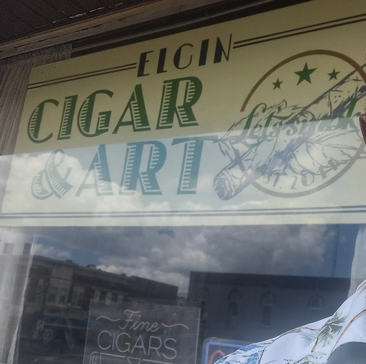 Elgin Cigar and Art profile